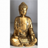 Statue dorée Bouddha qui médite