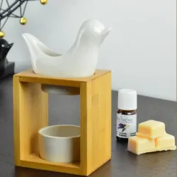 Oiseau en céramique pour chauffer les huiles Série Naturéa Modèle Birdy Blanc